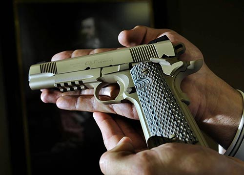 Hand held firearm