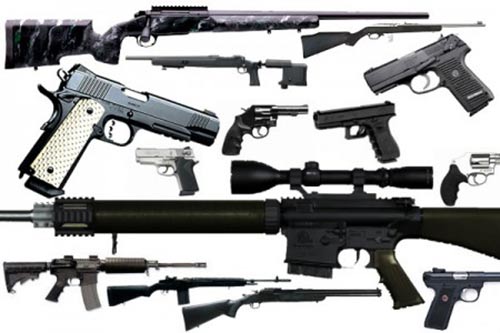 Image shows a variety of firearms.